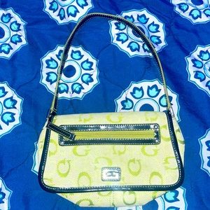 I am selling the Guess bag in the color Green.